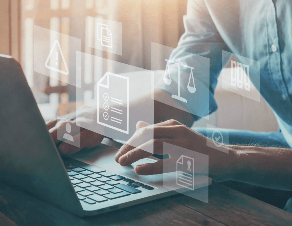 person working on financial services regulatory compliance on their laptop