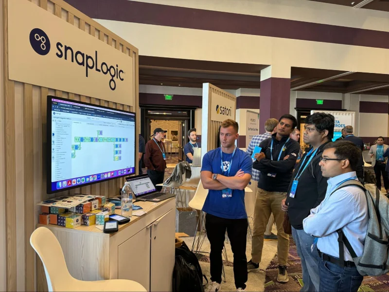 Attendees view a demo of the SnapLogic platform, up close and personal at the Snowflake Data Cloud World Tour stop in Austin.